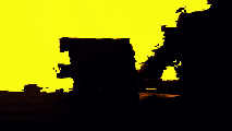 Silhouette of jagged cybersecurity rock formations against a vibrant yellow sky at dusk.