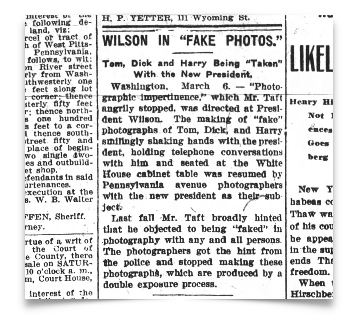 A newspaper clipping features several articles; a bold headline in the center reads “Wilson in ‘Fake Photos’.” The text discusses photos of Tom, Dick, and Harry being staged.