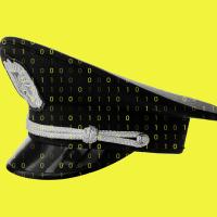 A police cap is covered with binary code on a bright yellow background.