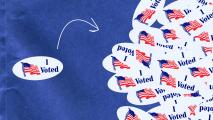 A single "I Voted" sticker is separated from a pile of identical stickers on a blue background, with a white arrow pointing towards the single sticker.