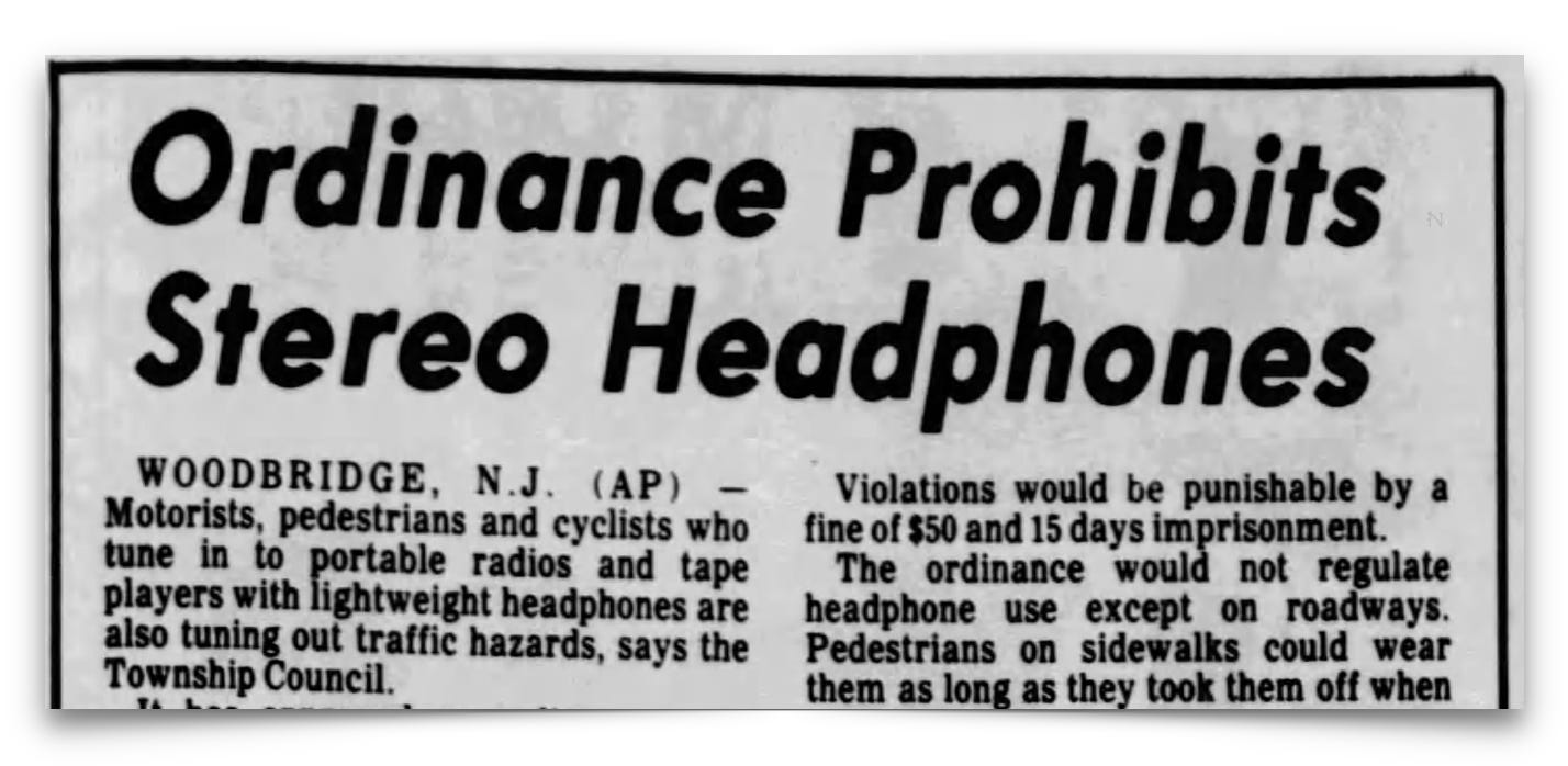 Newspaper clipping with headline "Ordinance Prohibits Stereo Headphones" describing a law in Woodbridge, NJ banning portable headphone use by motorists, pedestrians, and cyclists on roadways.